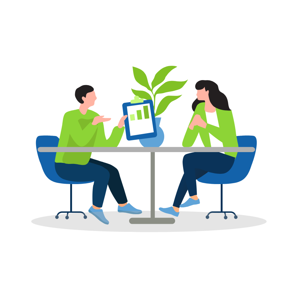Two people at a table with a large plant at the center, one of them holding up and pointing to a clipboard with data. Two people at a table with a large plant at the center, one of them holding up and pointing to a clipboard with data.